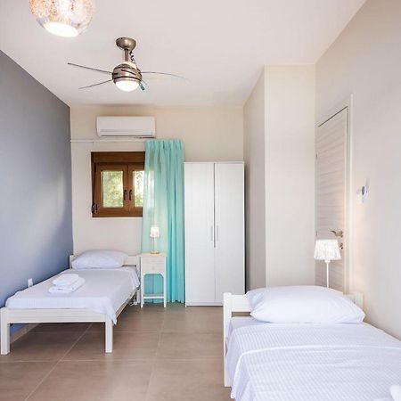 Nereus & Oceanus Beachfront Apartments, Lagonisi Beach #Feelslikehome Ormos Panagias Buitenkant foto